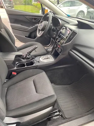 Shampooed front seats, console and floor mats after interior detailing