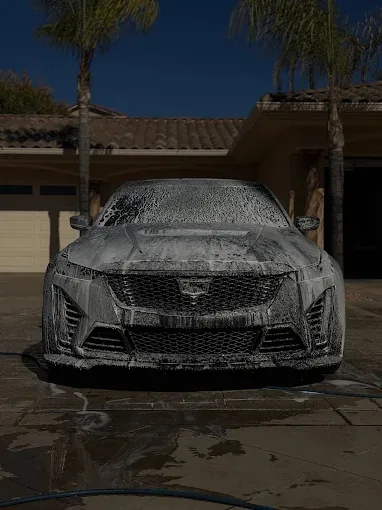 Cadillac CT5-V blackwing covered in foam on a Phoenix driveway